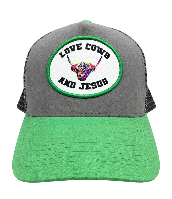 Gray and green cap with a colorful cow design and text on a transparent background