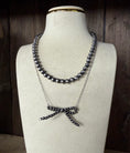 Load image into Gallery viewer, Native American, silver pearl bow inspired necklace
