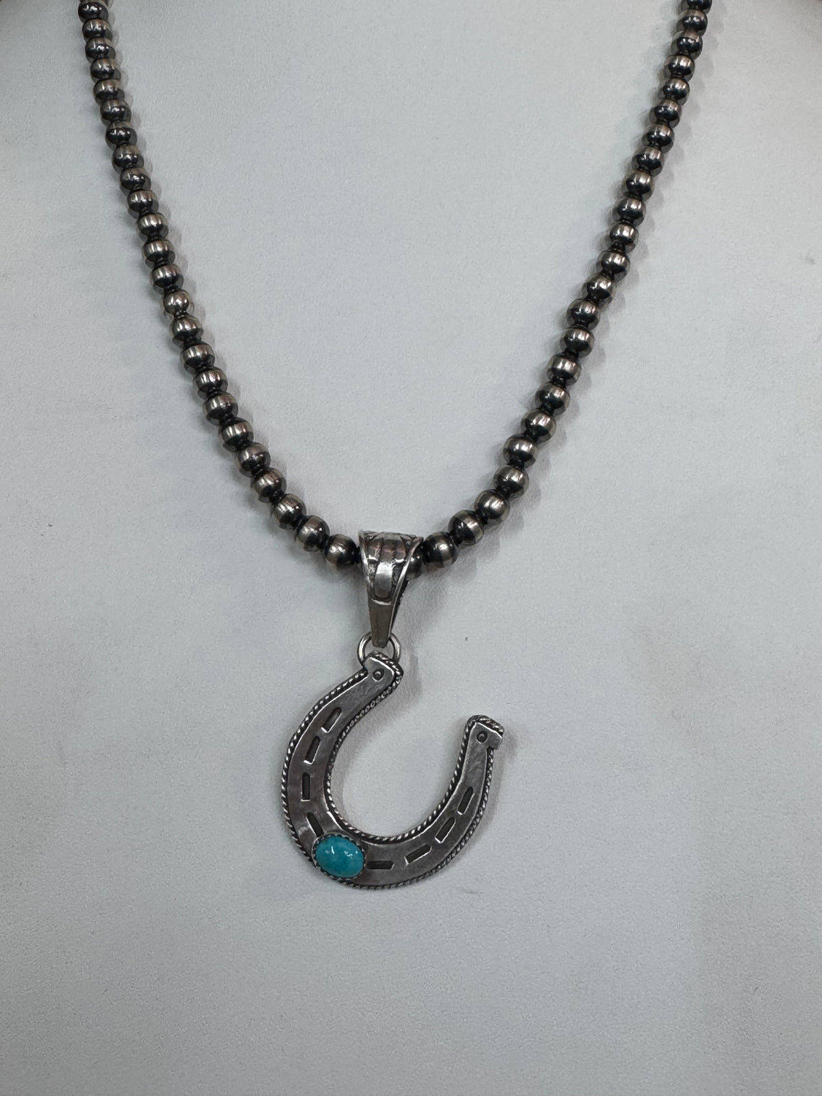 Native American Handmade Sterling Silver Horseshoe Pendant with Stone