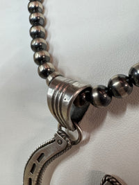 Native American Handmade Sterling Silver Horseshoe Pendant with Stone