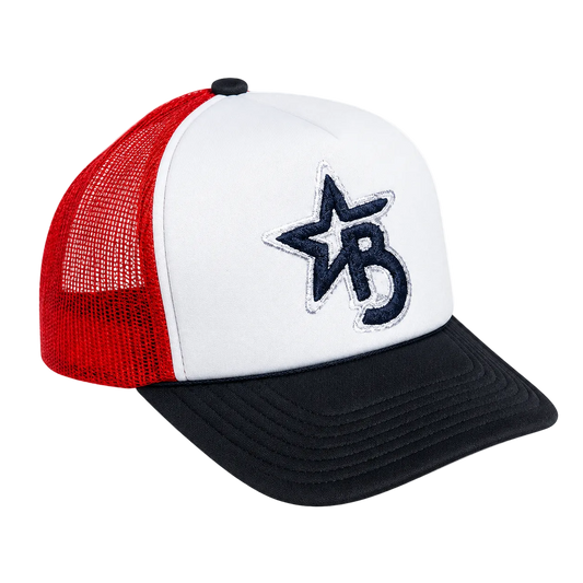 Trucker hat with red mesh back, white front panel, and black brim on a transparent background