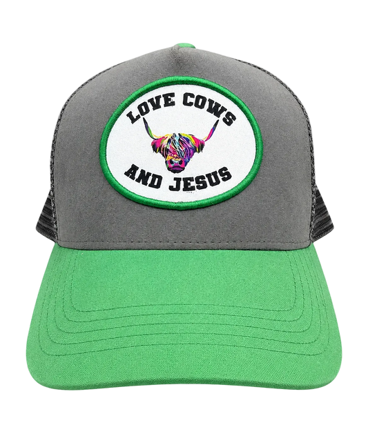 Gray and green cap with a colorful cow design and text on a transparent background