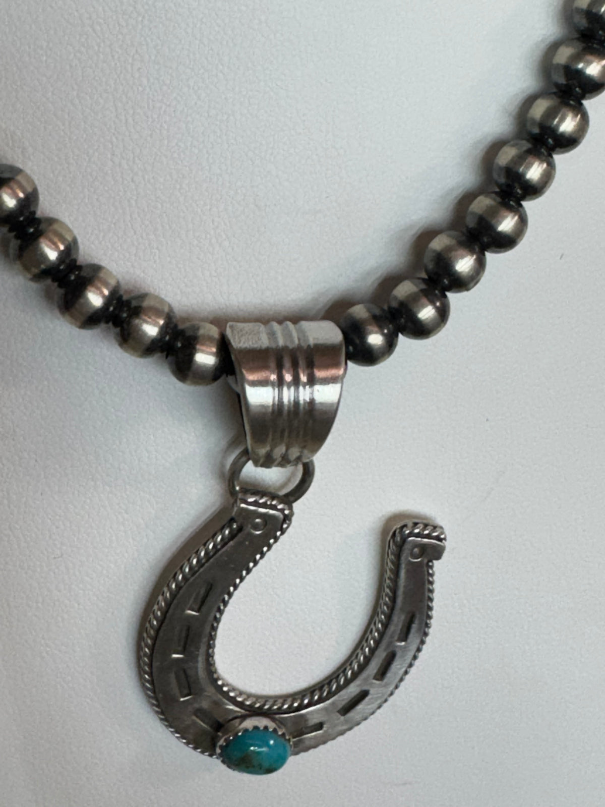 Native American Handmade Sterling Silver Horseshoe Pendant with Stone