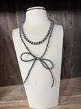 Load image into Gallery viewer, Beautiful Native American inspired silver pearl bow necklace ￼
